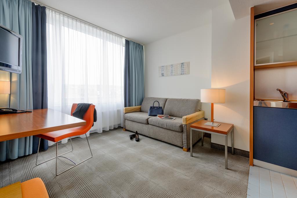 Chambre Exécutive avec Lit Queen-Size et Canapé